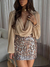 Vestido Feline – Glamour e Sensualidade com Toque Animal Print